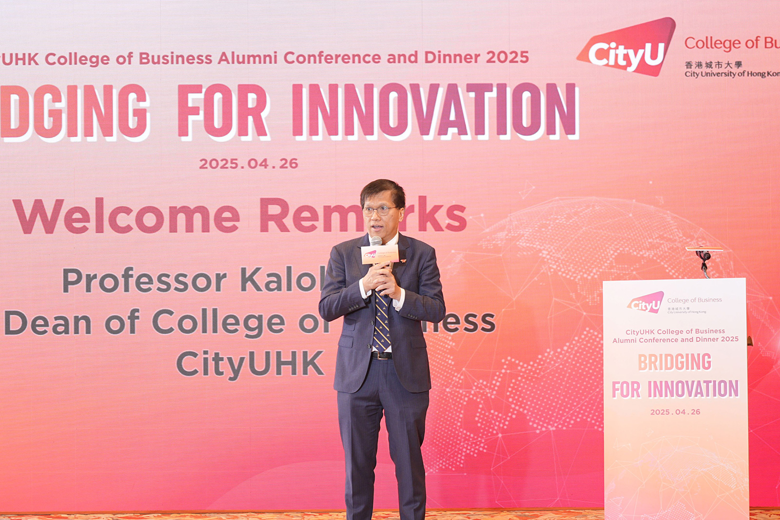Dean Kalok Chan welcomes alumni and guests in his opening remarks.