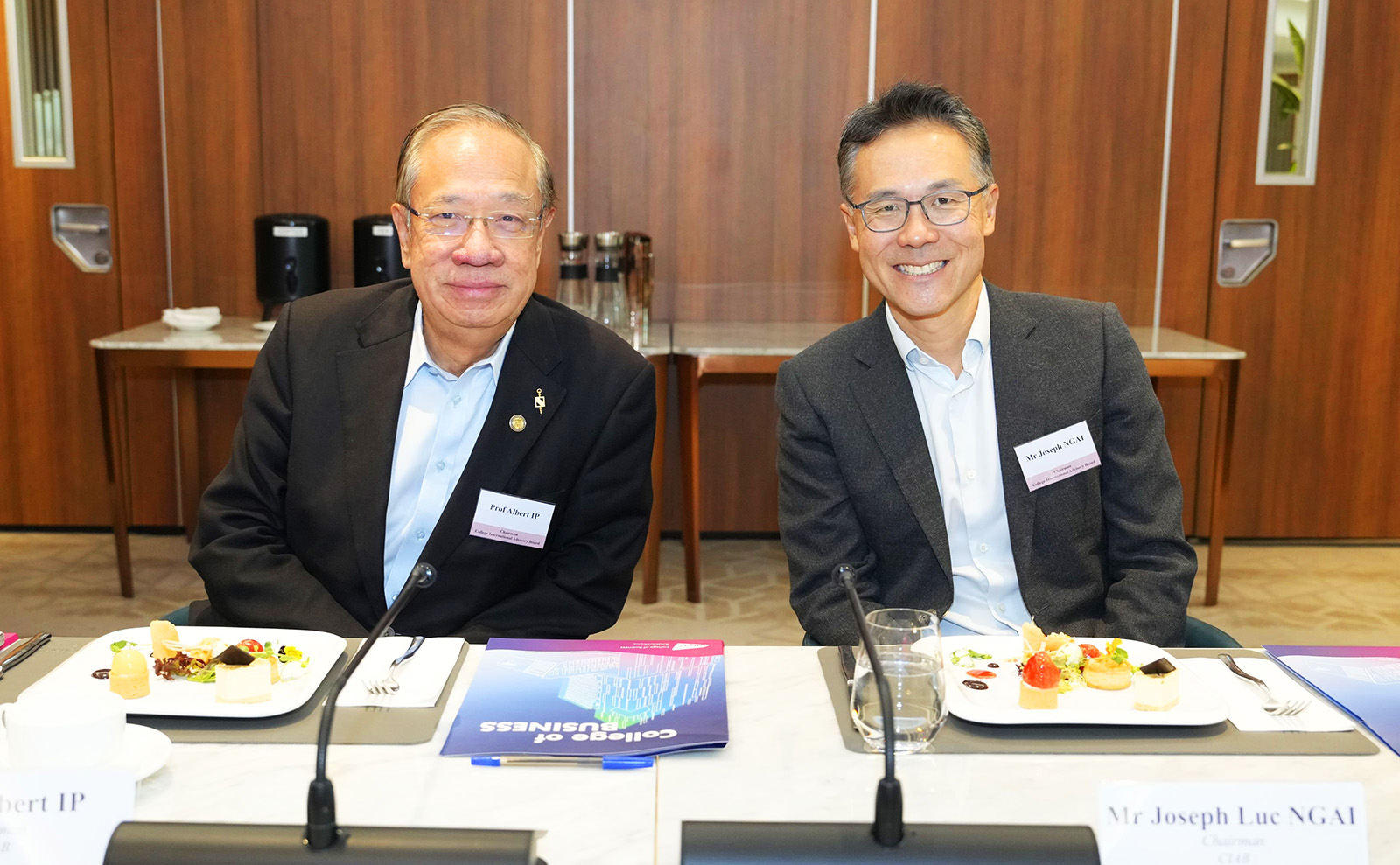 (From left) Prof. Albert Ip and Mr Joseph Ngai, the new Chairmen of the CIAB, welcome the members to the meeting.