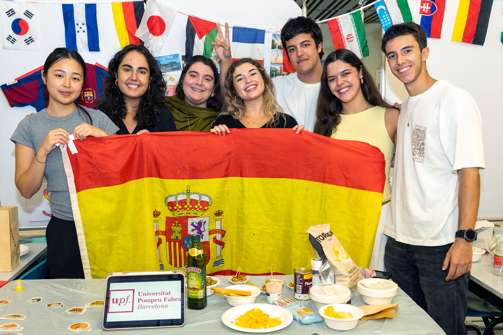 Spanish international exchange students share their culture through delicious food at their booth.