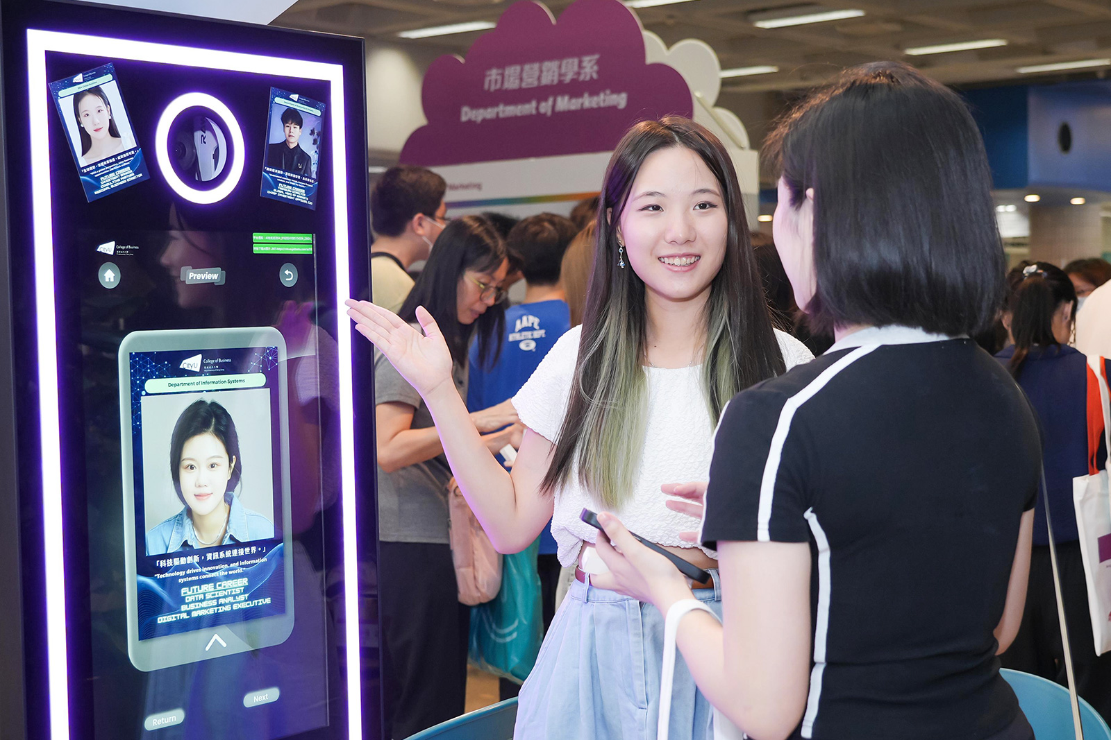 Prospective students interact with the AI photo kiosk to find the best UG programme.