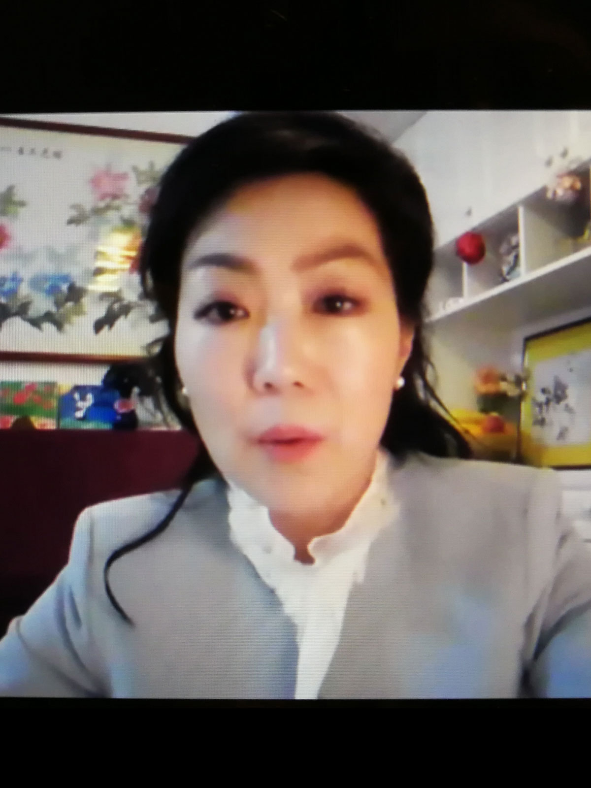 Ms Sherry Shi